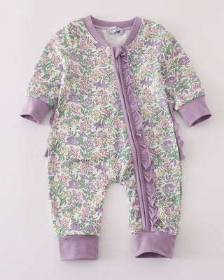 Floral baby onesie with purple accents on a light gray background