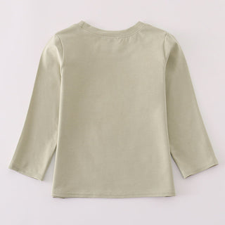 Light green long-sleeve top on a white background