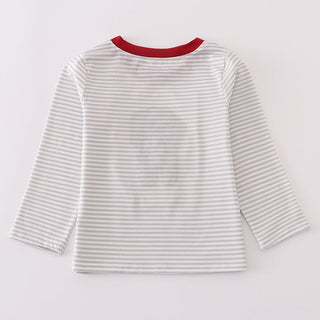 Striped shirt with red neckline on a light gray background