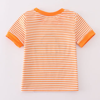 Orange and white striped t-shirt on a light gray background