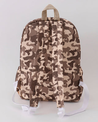 Camouflage-patterned backpack on a light gray background