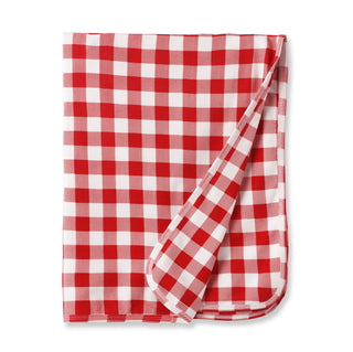 Red and white checkered blanket on a white background