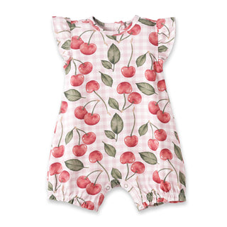 Baby romper with cherry pattern on a white background