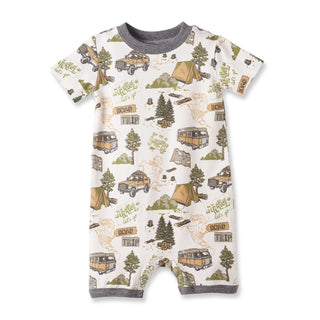 Baby romper with camping-themed print on a white background