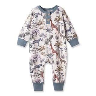 Baby onesie with animal print on a white background