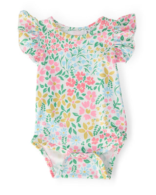 Floral-patterned baby romper on a white background