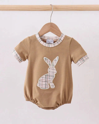 Brown baby romper with plaid bunny design on a hanger against a white background