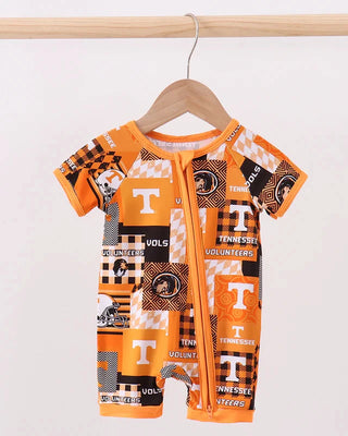 Baby romper with Tennessee Volunteers pattern on a hanger against a white background