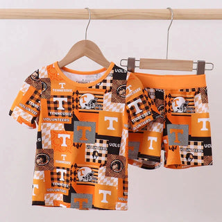 Children's Tennessee Volunteers sports-themed pajama set on hangers against a white background