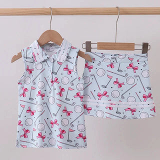 Children's sleeveless shirt and shorts set with golf-themed pattern on hangers against a plain background