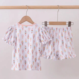 Children's outfit with ice cream pattern on a white background