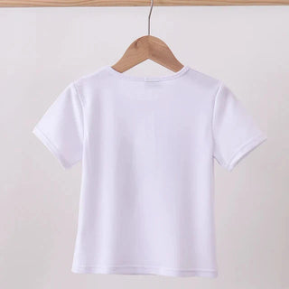 White t-shirt on a wooden hanger against a light gray background