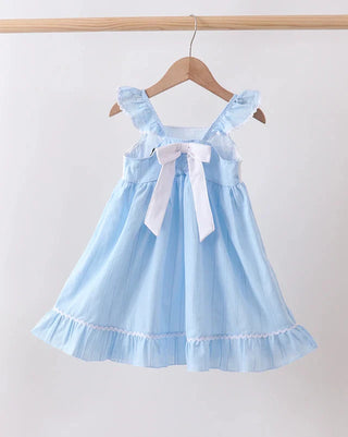 Light blue dress with ruffled sleeves and a bow tie on a wooden hanger against a white background
