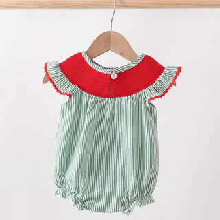 Green striped baby romper with red collar on a wooden hanger against a white background
