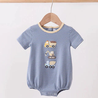 Blue striped baby romper with vehicle appliqués on a wooden hanger against a white background