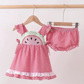 Red gingham baby top with watermelon design and matching bloomers on a hanger against a white background.