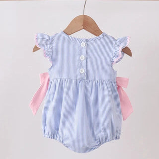 Blue and white striped baby romper with pink accents on a wooden hanger against a white background
