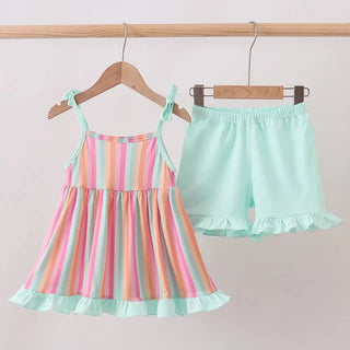 A toddler girl's two-piece clothing set hanging on wooden hangers against a plain light background. The set includes a sleeveless ruffled dress with pastel vertical stripes in pink, orange, yellow, green, and blue, paired with matching mint green ruffled shorts.