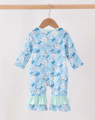 A baby long-sleeve romper in light blue with a white goose print and mint green ruffle hems, hanging on a wooden hanger against a plain light background.