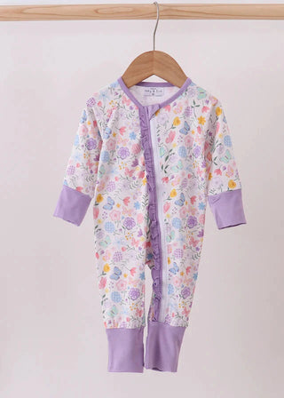 Floral-patterned baby onesie with purple accents on a hanger against a white background