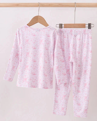 Pink pajama set with floral pattern on hangers against a white background