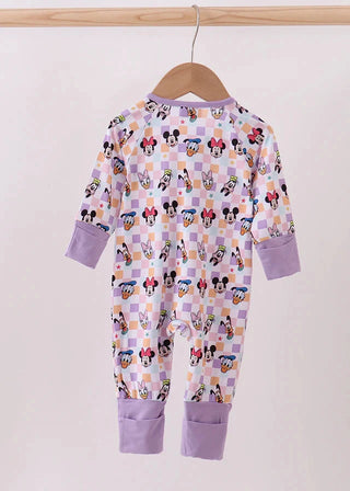 Children's onesie with cartoon character print on a hanger against a white background
