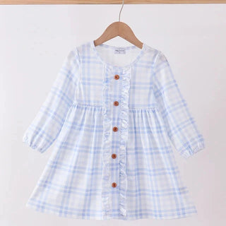 A light blue and white plaid long-sleeve baby dress with a button-front ruffle detail, hanging on a wooden hanger against a plain light background.