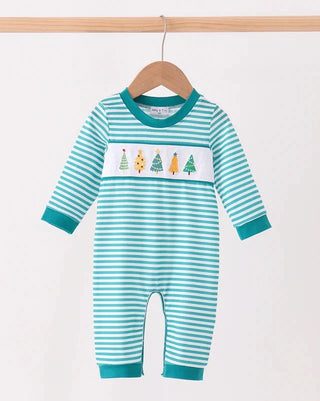 A baby long-sleeve romper with teal and white horizontal stripes, featuring a white chest band decorated with colorful Christmas trees, hanging on a wooden hanger against a light background.