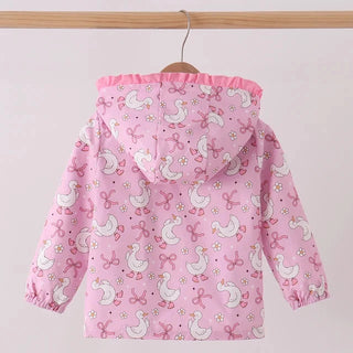 A pink hooded jacket with a white and pink goose print, hanging on a wooden hanger from a light wood rod against a plain light background.