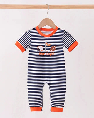 A baby short-sleeve romper with navy and white horizontal stripes, bright orange trim on the collar, cuffs, and hem, and an orange 'The Big Eagle' football graphic on the chest, hanging on a wooden hanger.