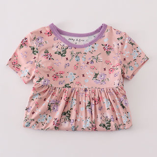 Floral-patterned dress on a light gray background