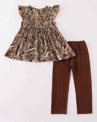 Camouflage top and brown pants on a white background