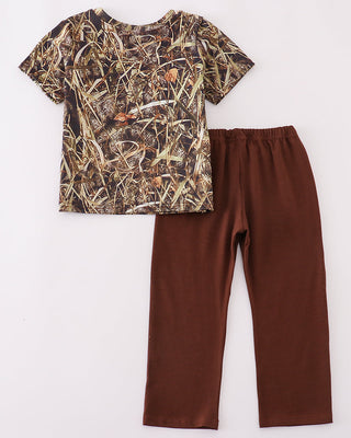 Camouflage shirt and brown pants on a white background