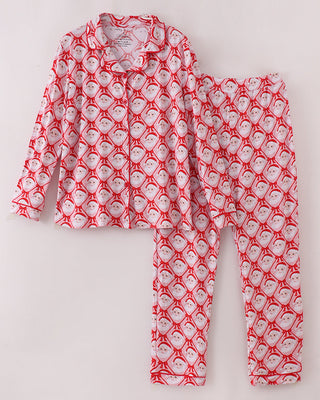 Red and white pajama set with a pattern on a light gray background