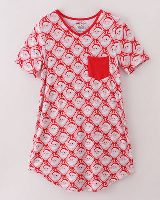 Red and white Santa patterned nightgown with a pocket on a light gray background