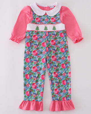 Baby romper with floral patterned pants and pink long-sleeve top on a light gray background