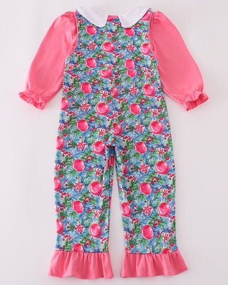 Baby romper with floral overalls and pink long-sleeve shirt on a white background