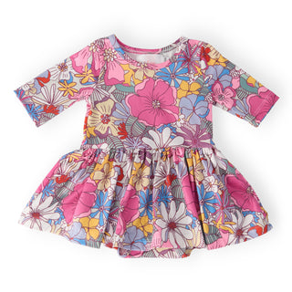 Colorful floral dress on a white background