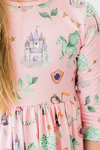 Pink dress with castle, unicorn, and princess print