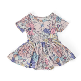 Floral patterned dress on a white background