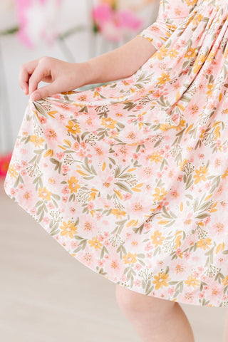 Close-up of a floral dress with a blurred background